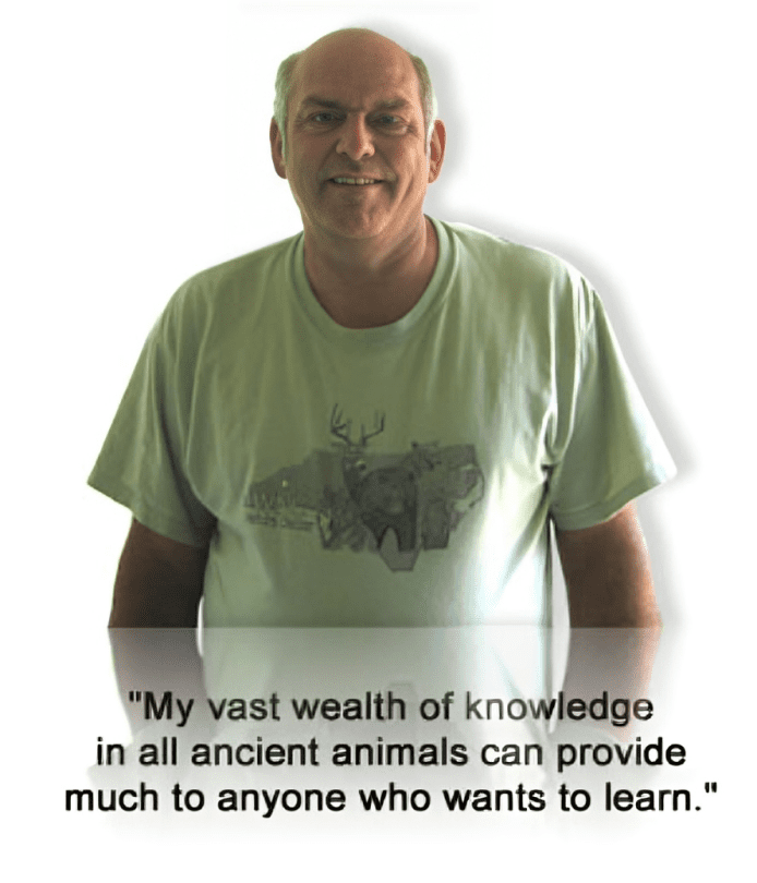 A man wearing a white shirt and some words