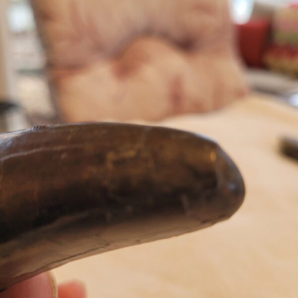 A banana sitting on top of a table.