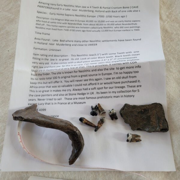 A piece of paper with some pieces of metal on it